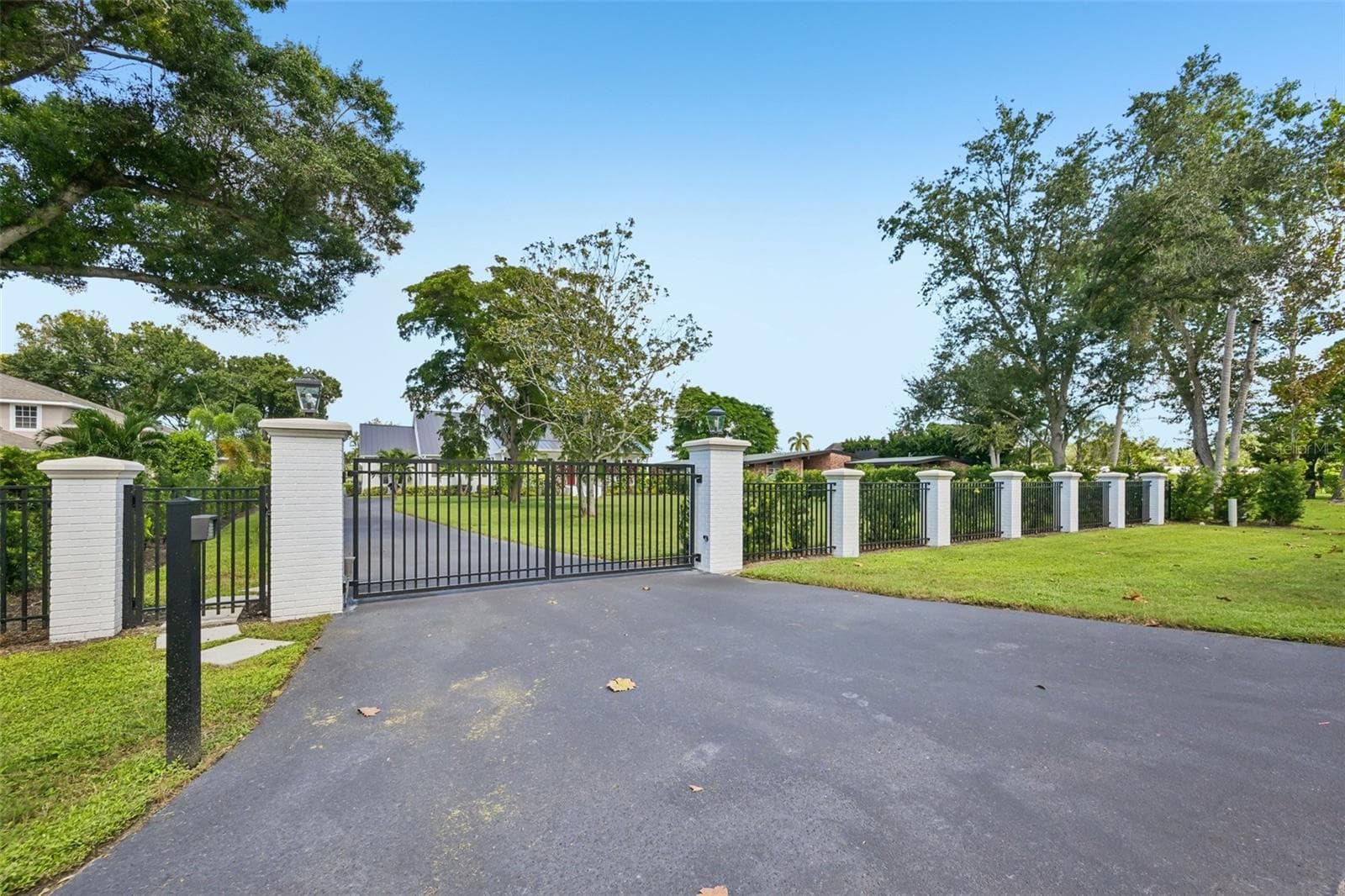 This Luxury home is behind it's own private gate. - 5060 18TH AVE W, BRADENTON