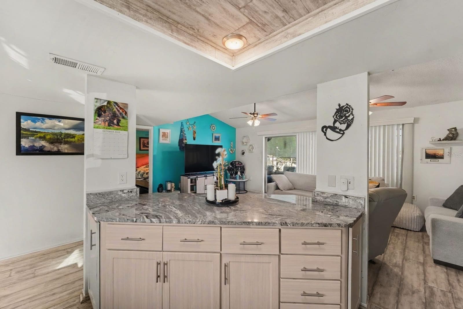 Spacious Open Floor Plan: Island Kitchen Flows Into Living Areas - 8431 REDFIELD DR, PORT RICHEY