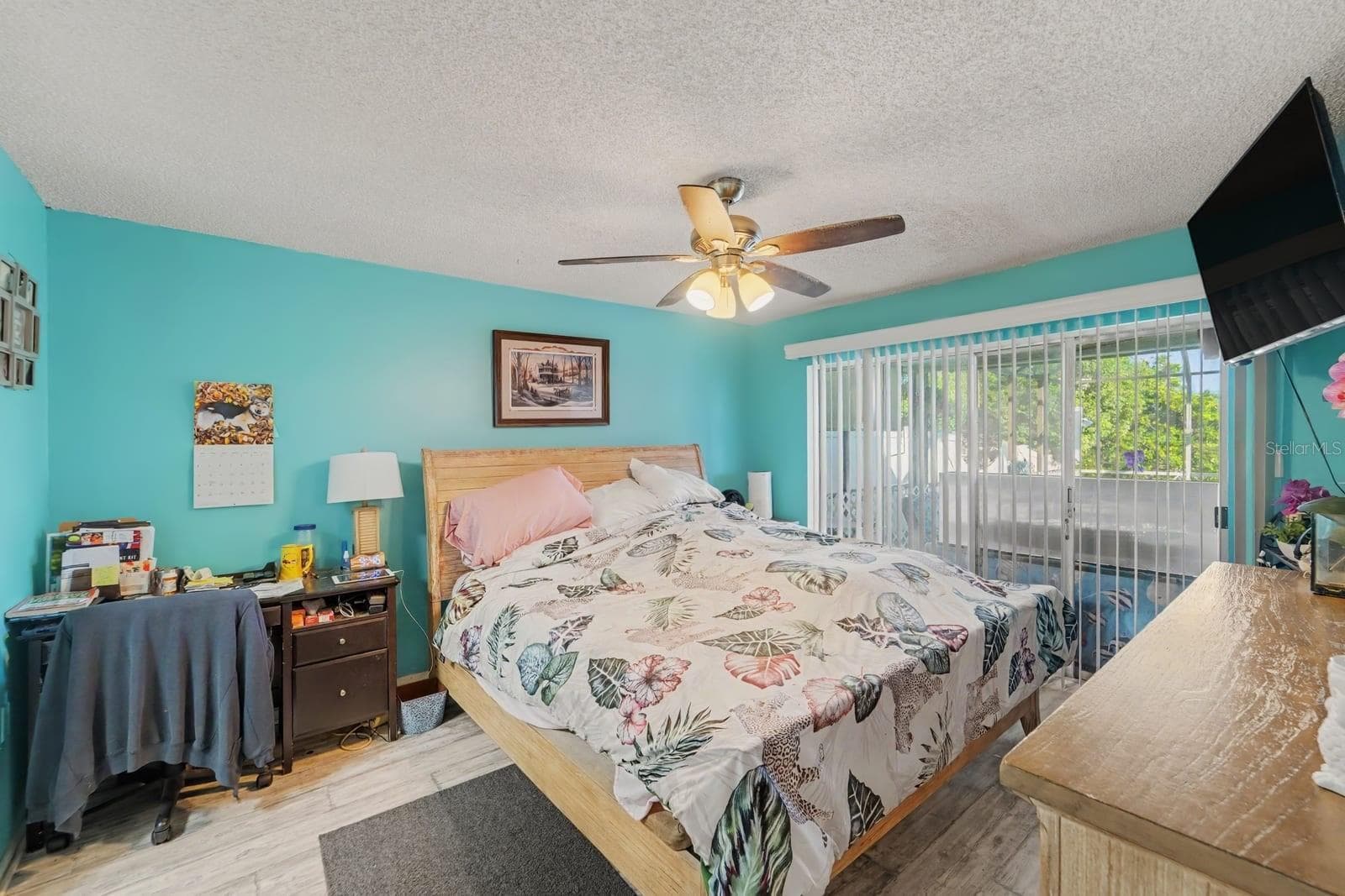Turquoise Master Bedroom With Natural Light, Ceiling Fan & Walk-In Closet - 8431 REDFIELD DR, PORT RICHEY