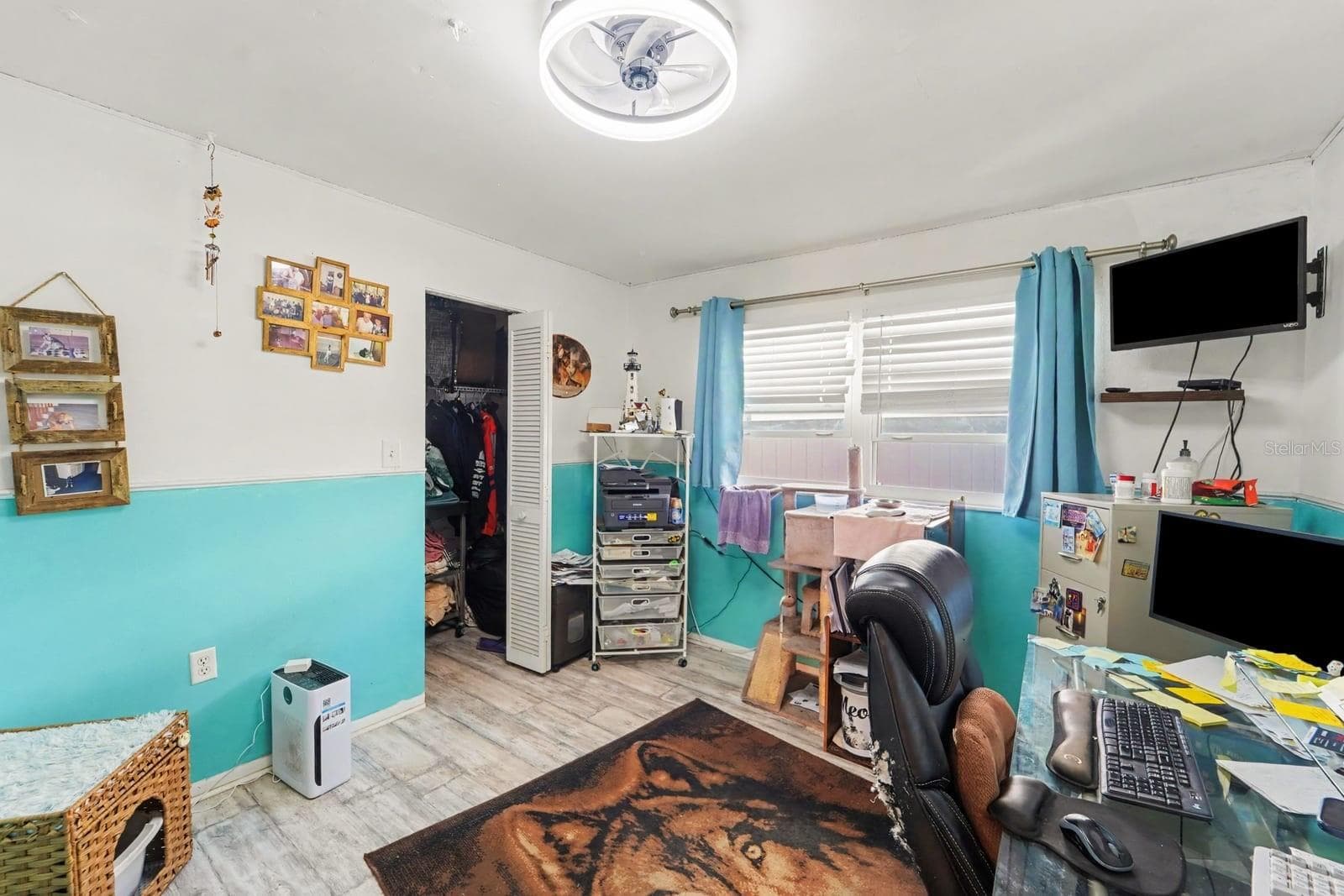 Multi-Purpose Office Room with Built-In Shelving, Workspace & Storage Solutions - 8431 REDFIELD DR, PORT RICHEY