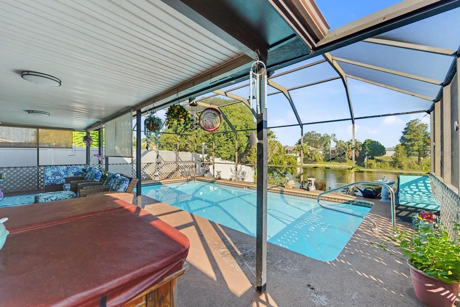 Covered Pool Deck with Retractable Shade, Hot Tub & Scenic Lakefront Views - 8431 REDFIELD DR, PORT RICHEY