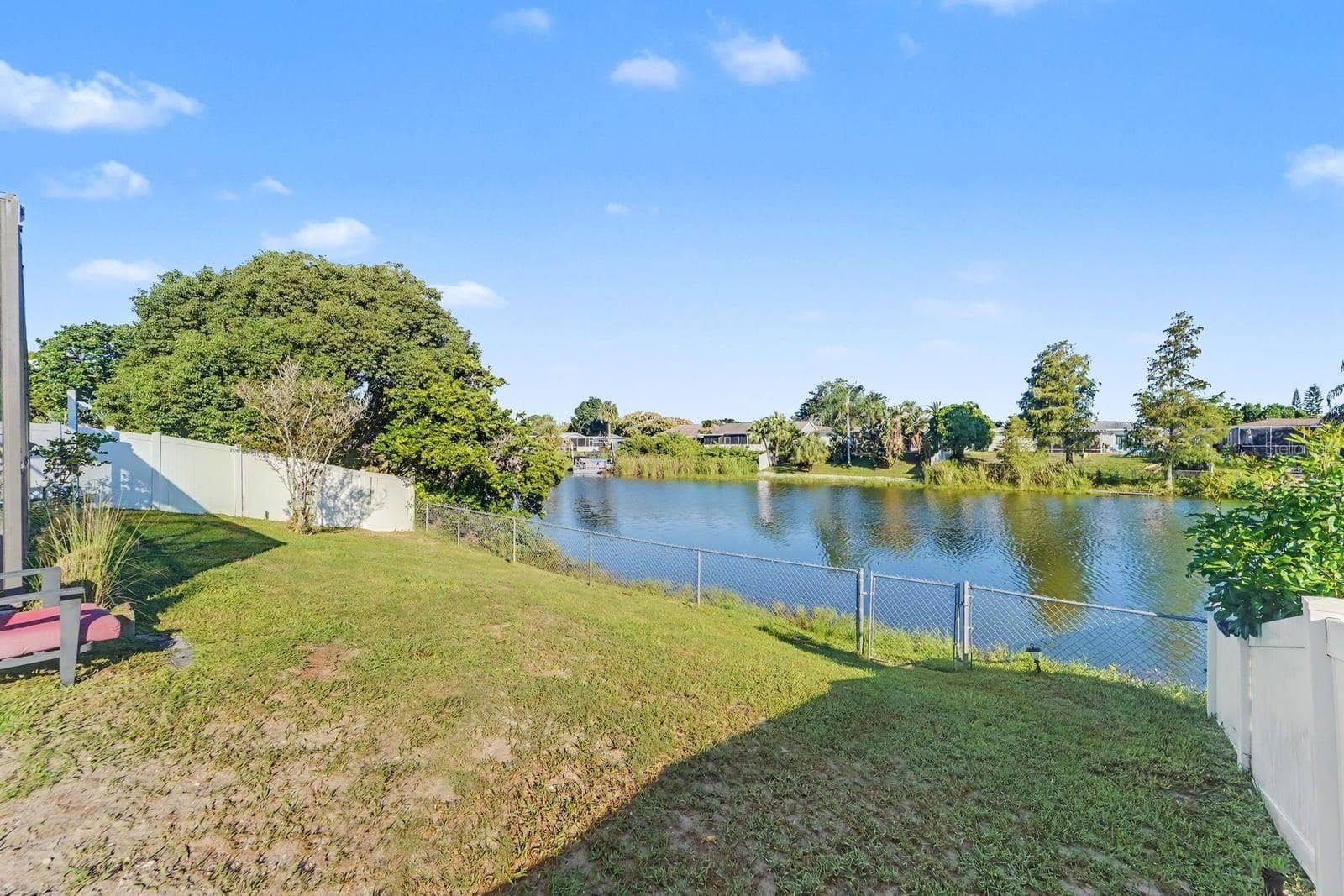 Expansive Backyard with Direct Waterfront Access & Fenced Perimeter - 8431 REDFIELD DR, PORT RICHEY