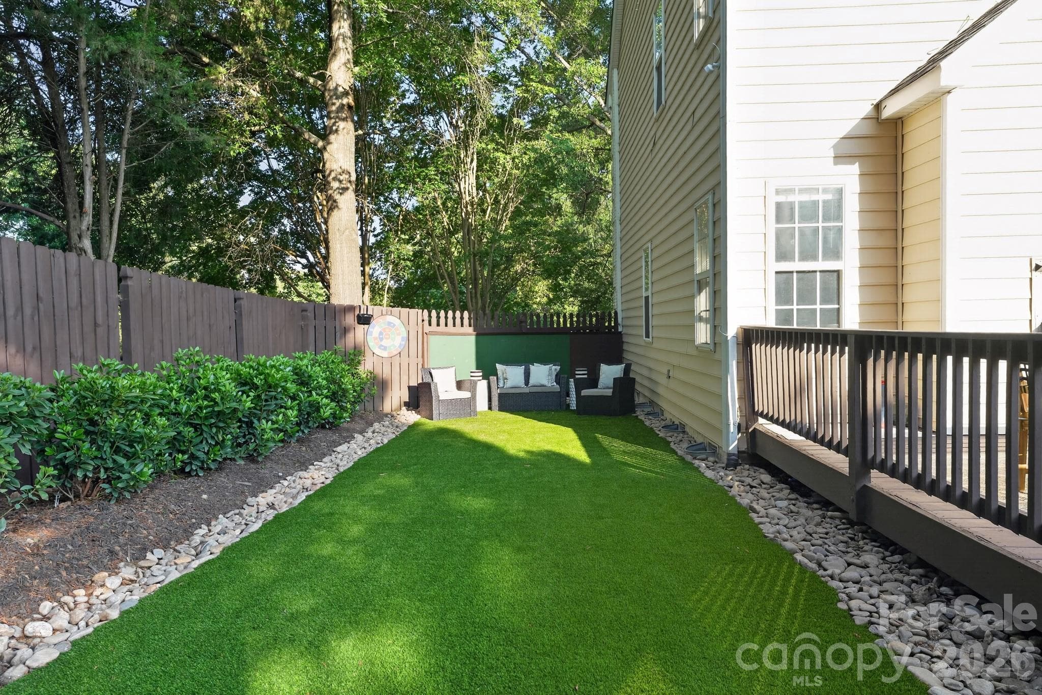 Don't forget to look to the side of the deck at the turf - a great play space - 10513 Orchid Hill Lane, Charlotte