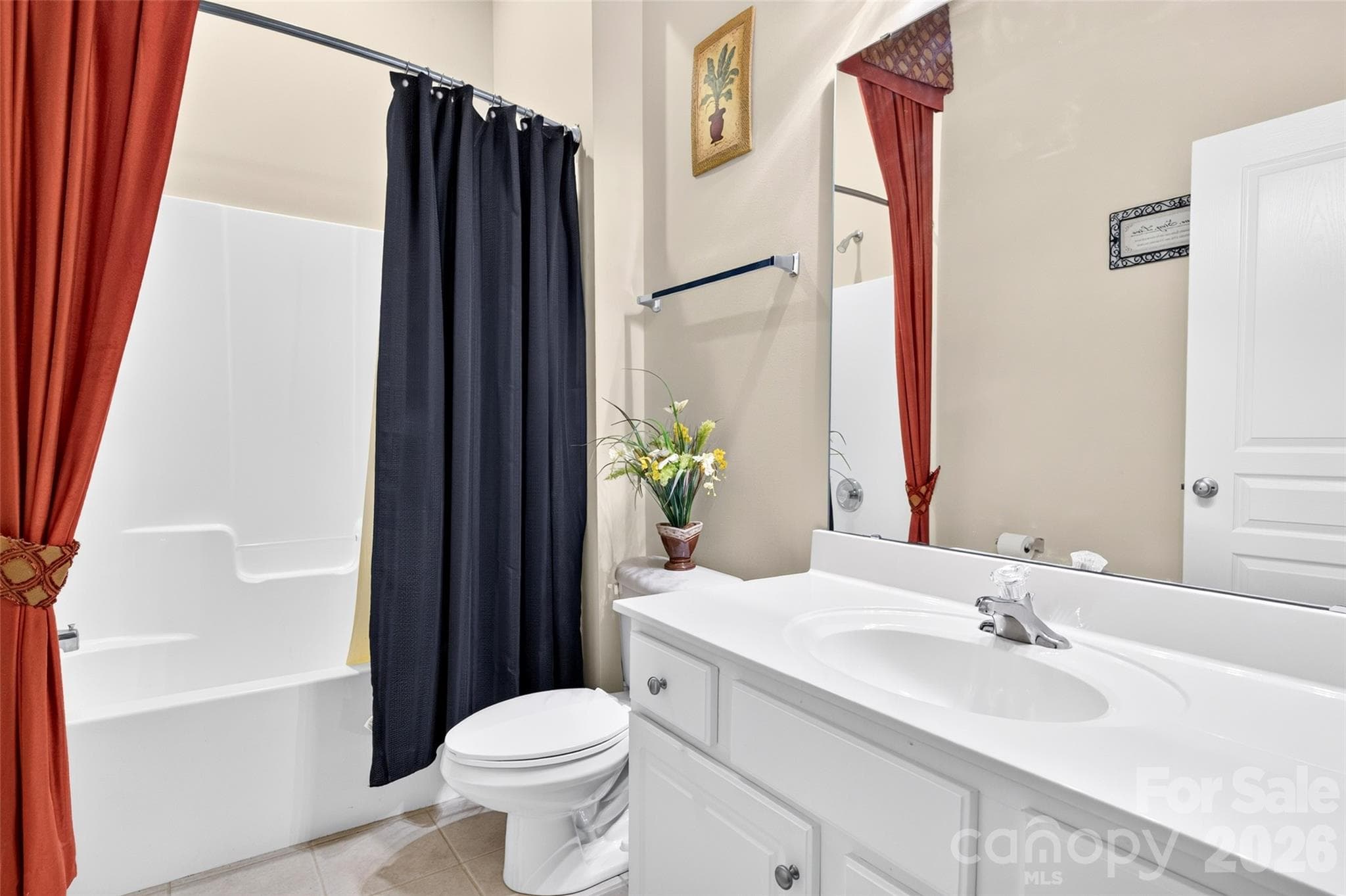 Second Full Bathroom adjacent to the 2nd bedroom with tile flooring. - 8432 Brookings Drive, Charlotte