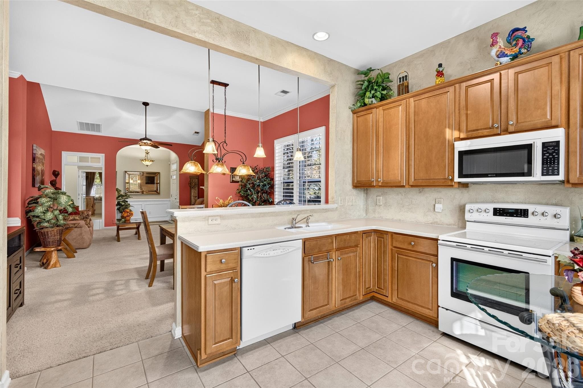 Chef's Kitchen with white appliances - 8432 Brookings Drive, Charlotte