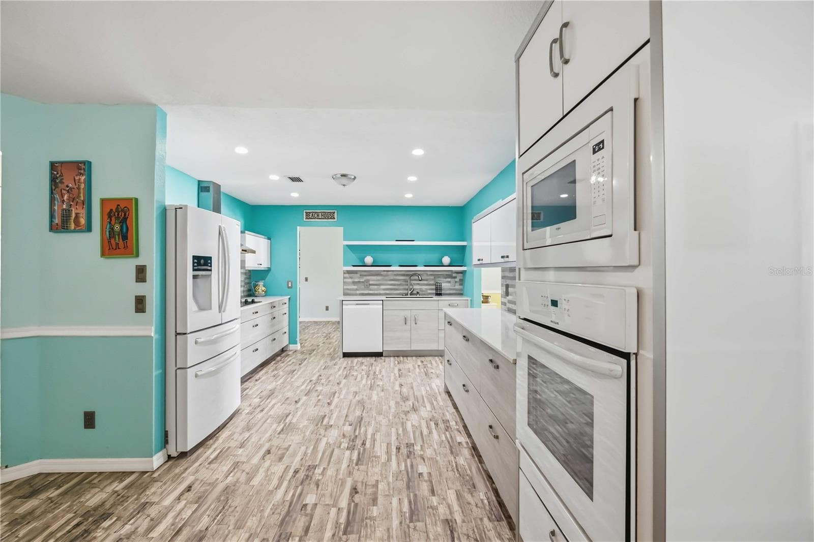 Kitchen view toward the living area - 21012 CHURON AVE, PORT CHARLOTTE