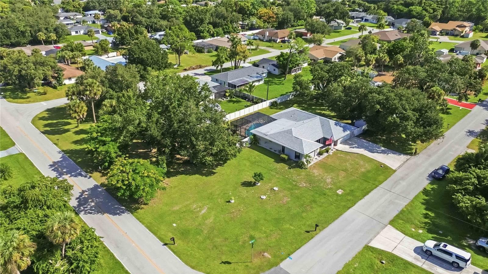 Large yard consisting of 3 lots - 21012 CHURON AVE, PORT CHARLOTTE