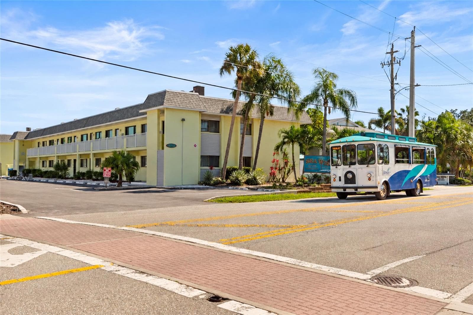 Free Siesta Key trolley stops in front of the building - 6703 MIDNIGHT PASS RD #101, SARASOTA