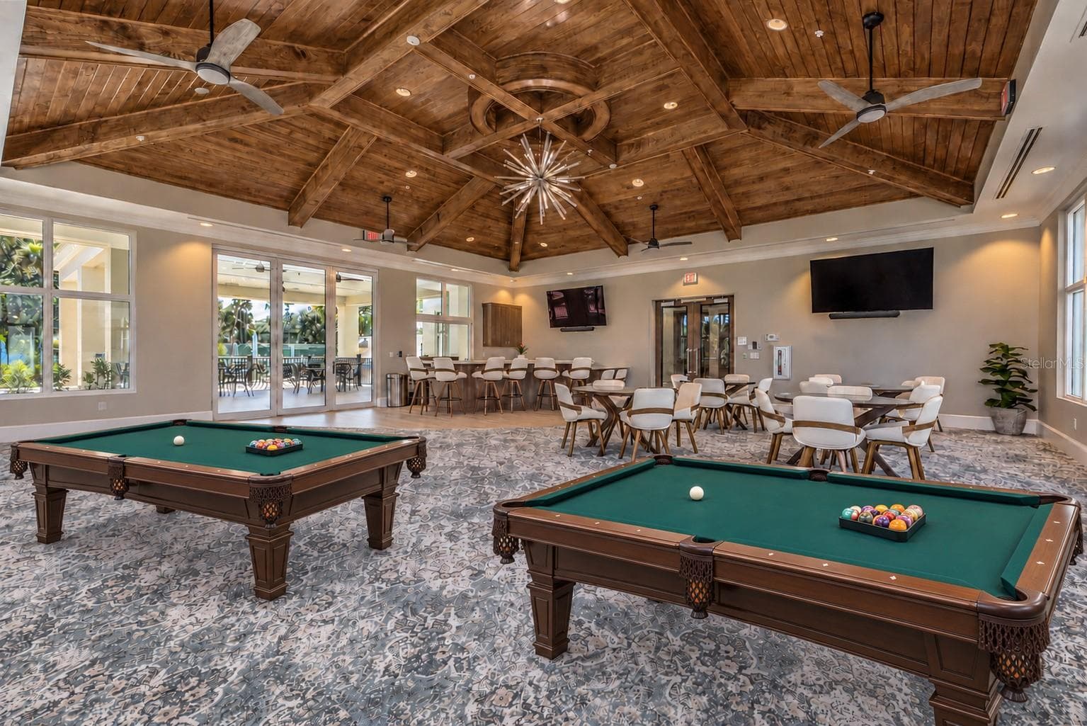 Pool tables virtually added to illustrate planned billiards area. - 735 NAVIGATORS WAY, EDGEWATER
