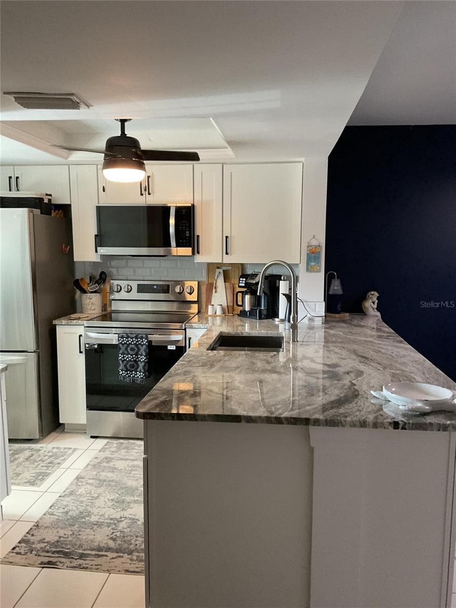 Condominium at 12538 SW KINGSWAY CIR #908, LAKE SUZY, photo 13 of 62