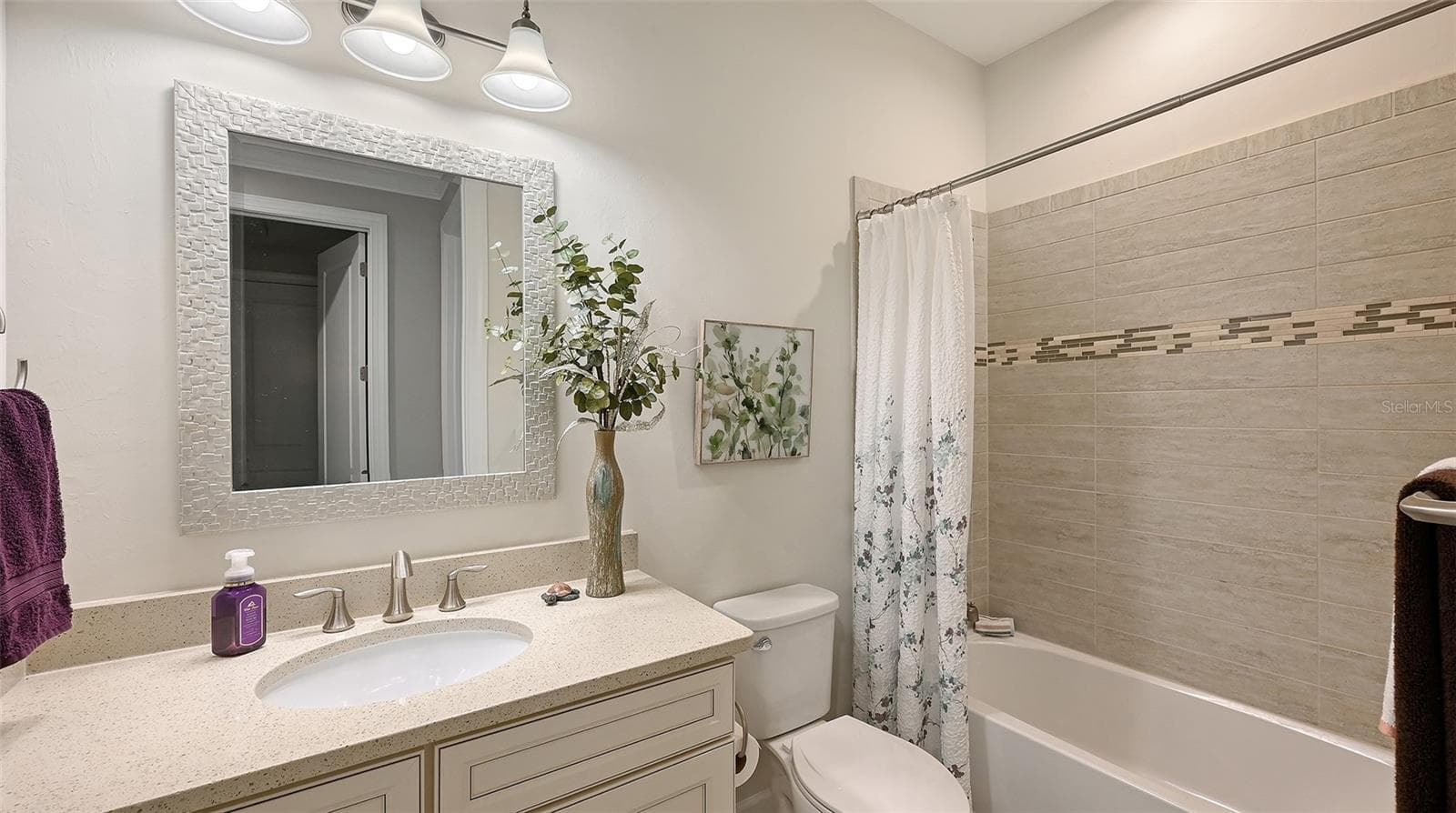 Guest bathroom alongside the third bedroom. - 6827 GOSPORT CV, BRADENTON