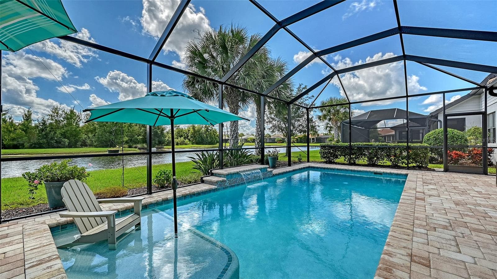 Embrace the stunning view of the captivating water view, and the calming serene feeling of comfort. - 6827 GOSPORT CV, BRADENTON