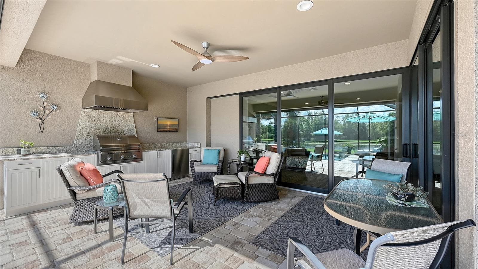 Entertain guests, host a delightful cookout, or simply unwind poolside as the sparkling pool shimmers in the sunshine. - 6827 GOSPORT CV, BRADENTON