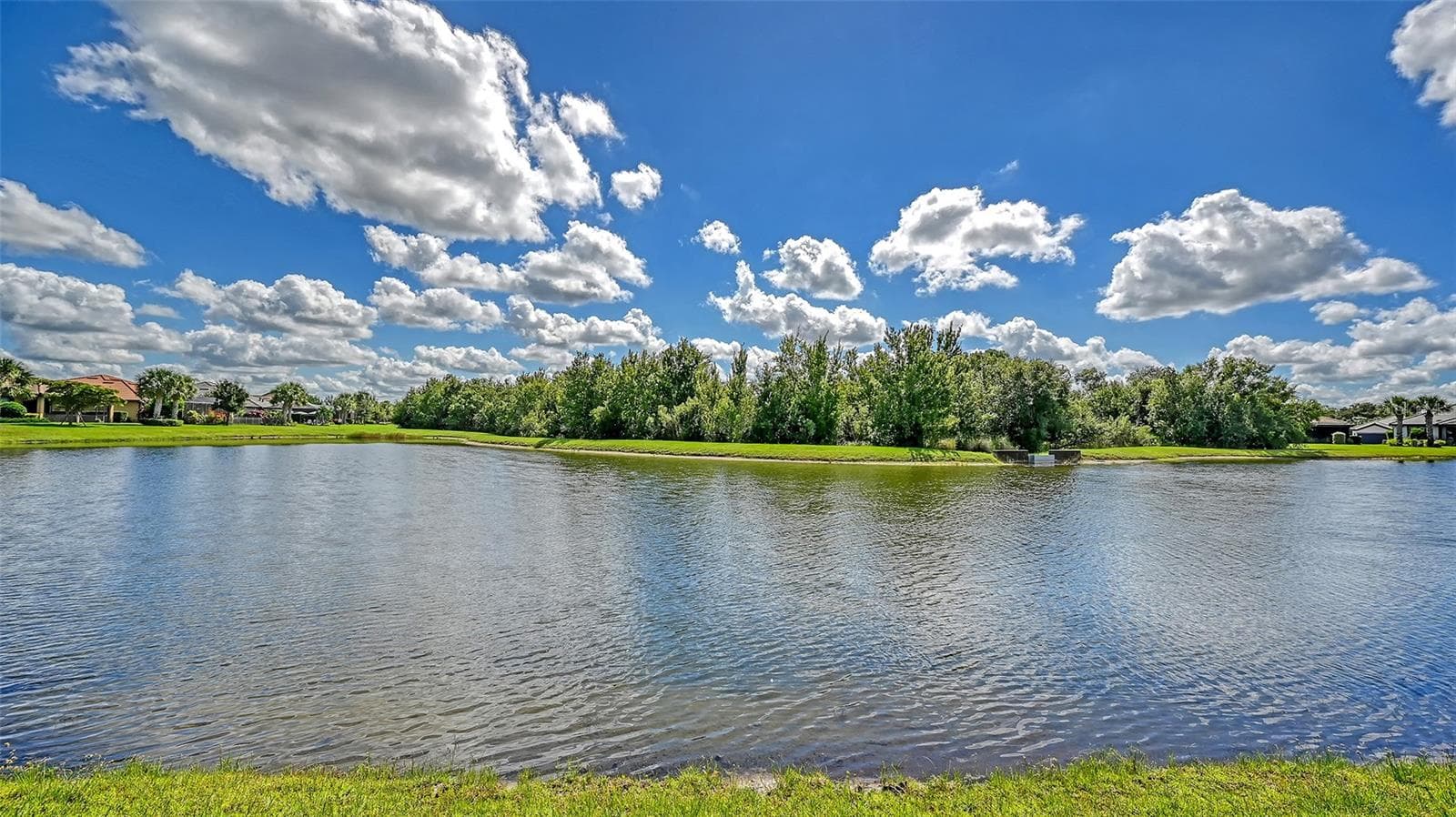 The spectacular water views create an atmosphere of serenity, warmth, and effortless tranquility. - 6827 GOSPORT CV, BRADENTON