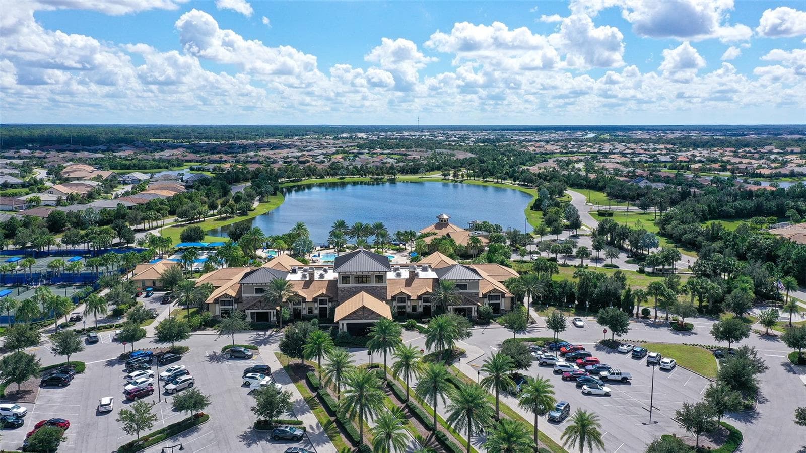 Enjoy an exceptional resort-inspired lifestyle at the Del Webb clubhouse, featuring outstanding fitness facilities, welcoming gathering spaces, and amenities designed for recreation, relaxation, and social connection. - 6827 GOSPORT CV, BRADENTON