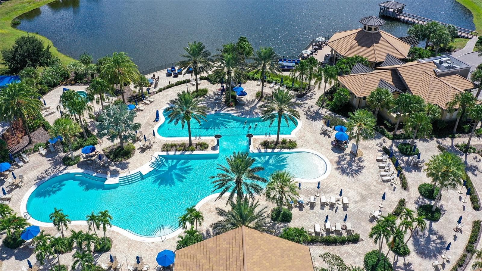 Enjoy the exceptional clubhouse pool, and inviting oasis designed for relaxation, recreation, and resort-style living. - 6827 GOSPORT CV, BRADENTON
