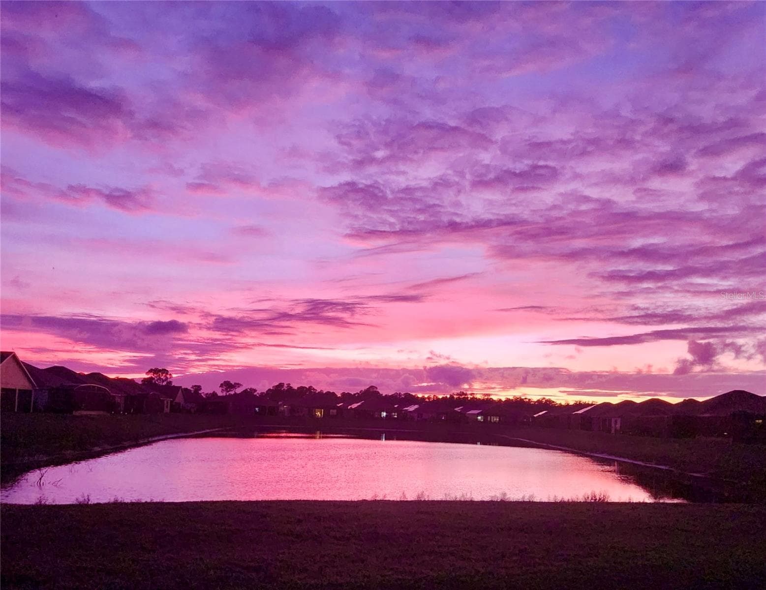 Sunset over the pond - 6125 PEBBLE BEACH BLVD, WINTER HAVEN