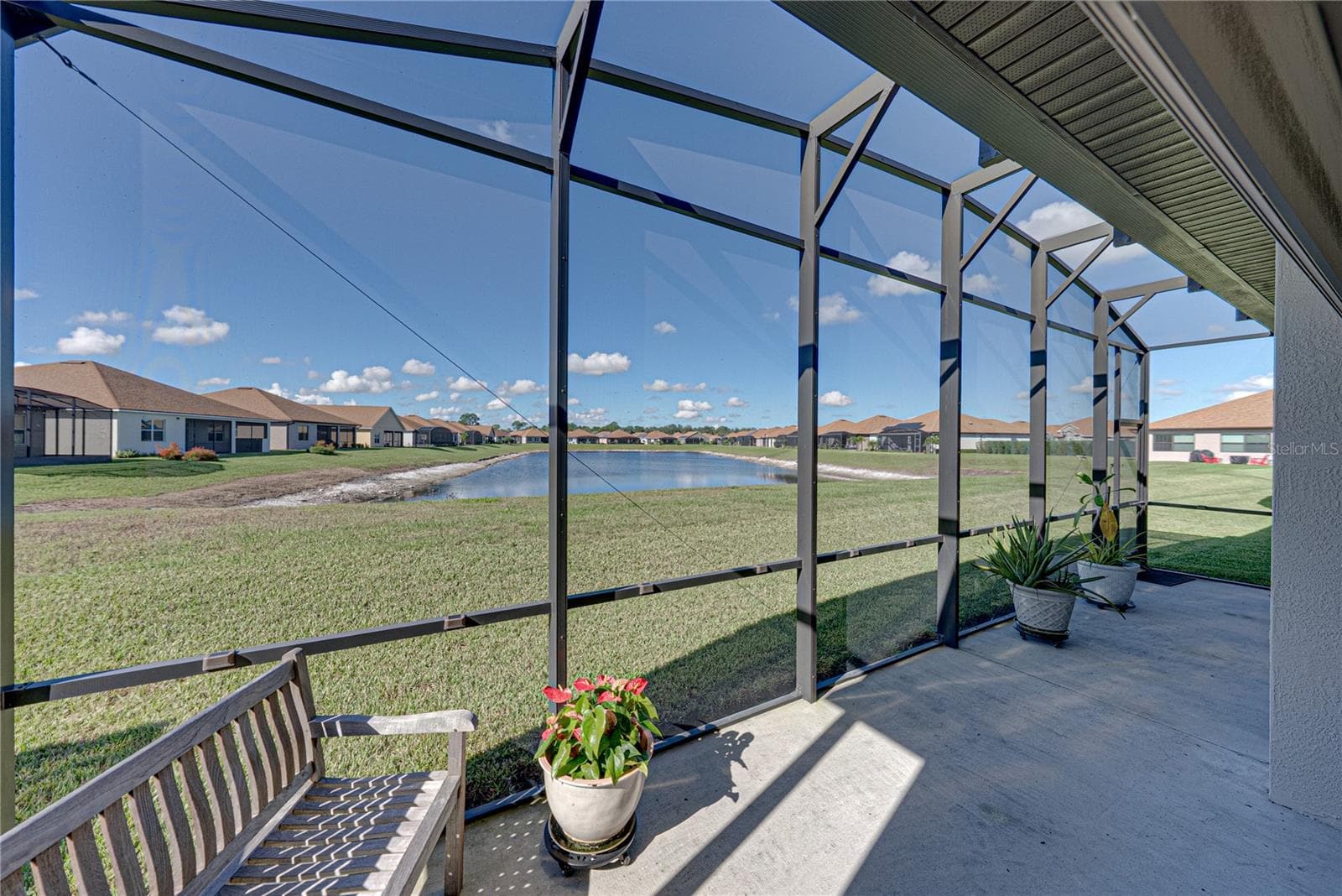Extended, screened veranda - 6125 PEBBLE BEACH BLVD, WINTER HAVEN