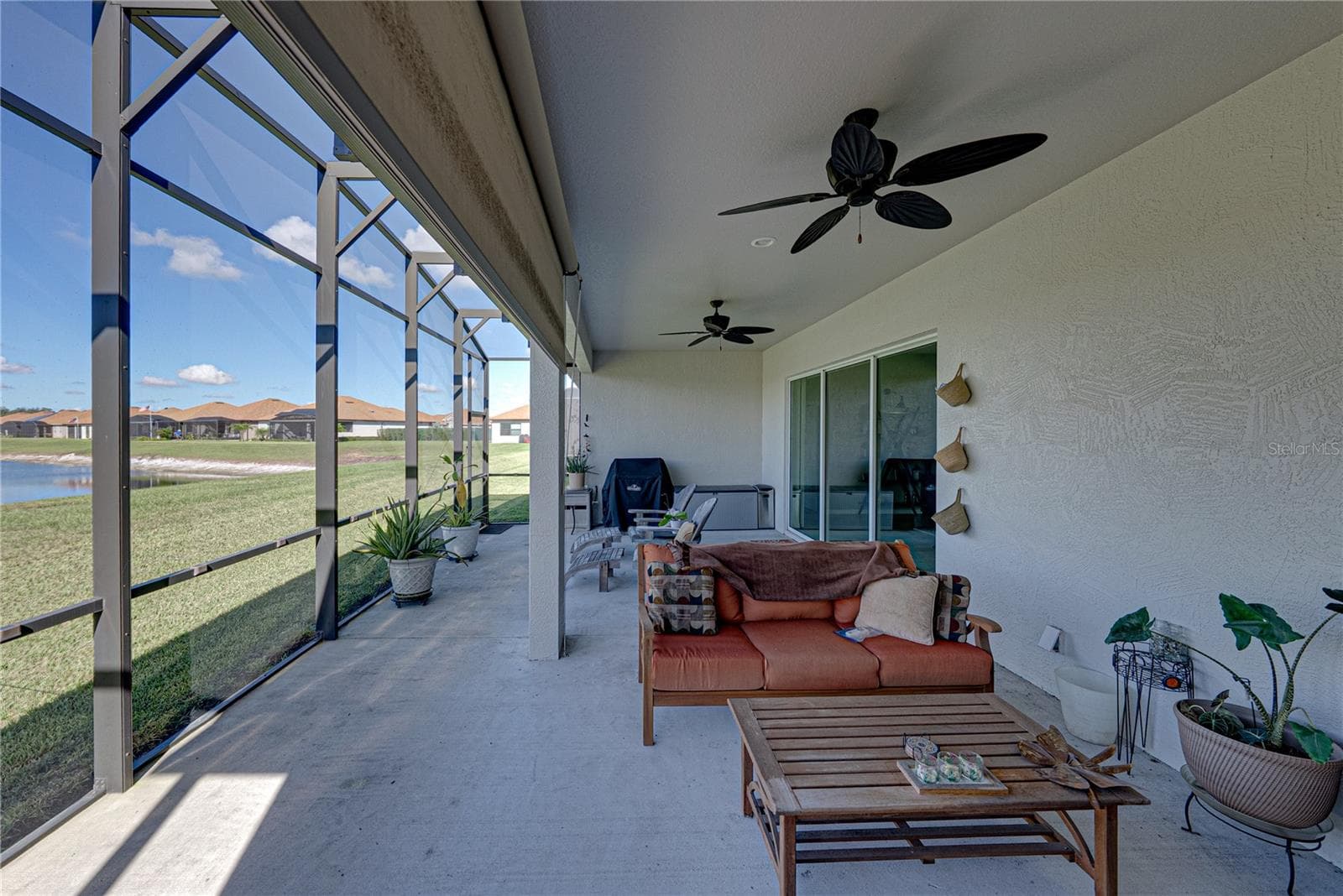 Extended, screened veranda - 6125 PEBBLE BEACH BLVD, WINTER HAVEN