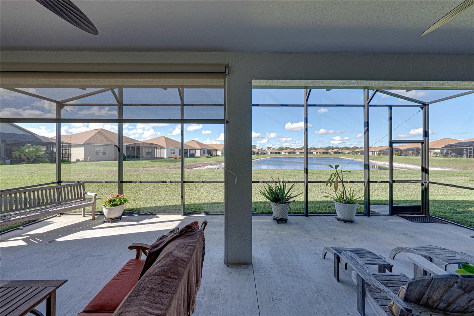 Extended, screened veranda - 6125 PEBBLE BEACH BLVD, WINTER HAVEN