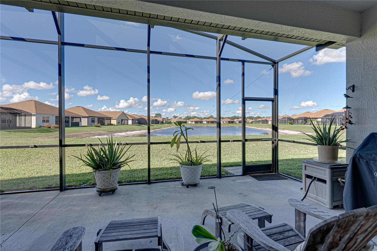 Extended, screened veranda - 6125 PEBBLE BEACH BLVD, WINTER HAVEN