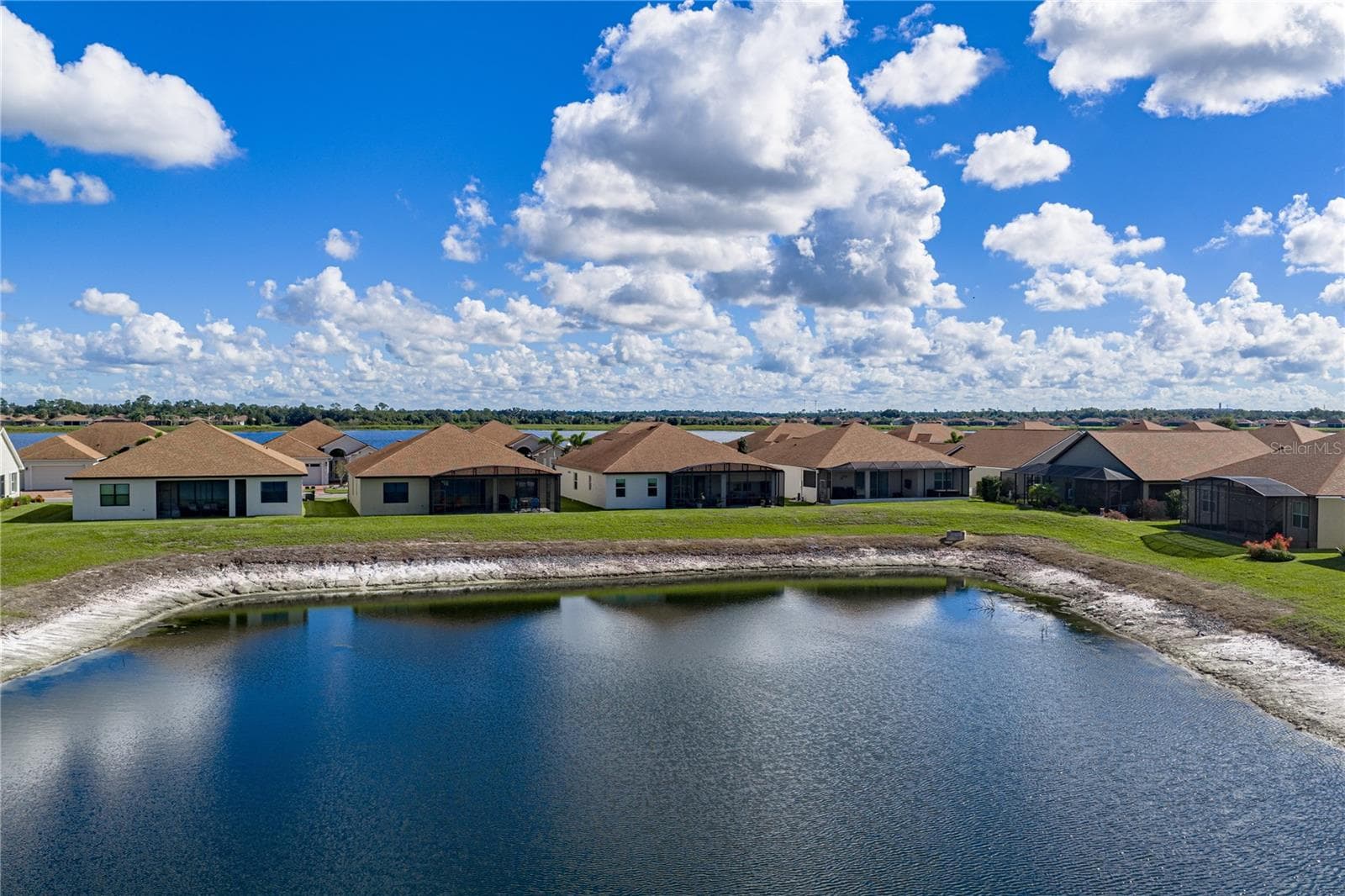 Pond behind house - 6125 PEBBLE BEACH BLVD, WINTER HAVEN