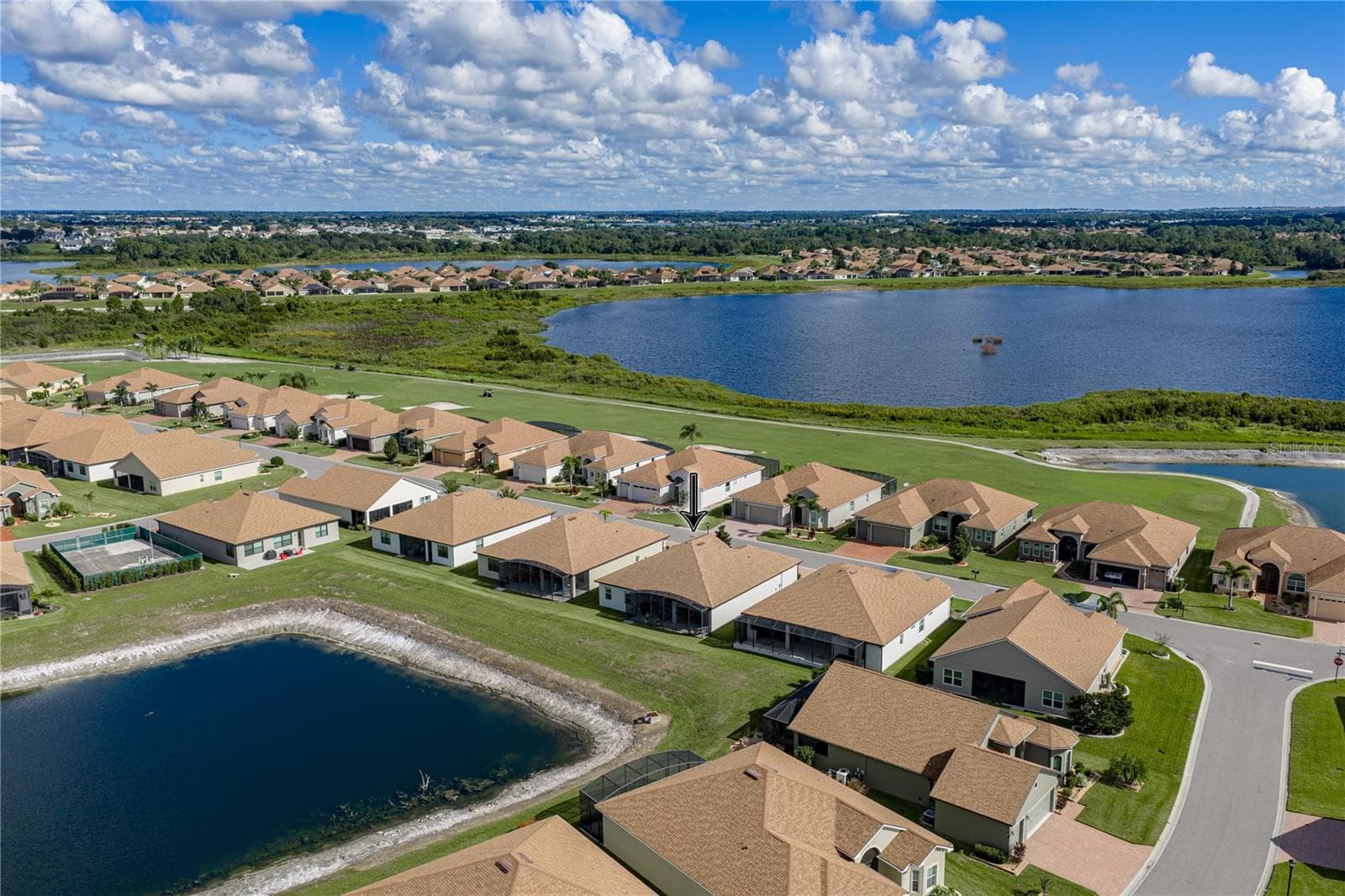 Neighborhood drone view - 6125 PEBBLE BEACH BLVD, WINTER HAVEN