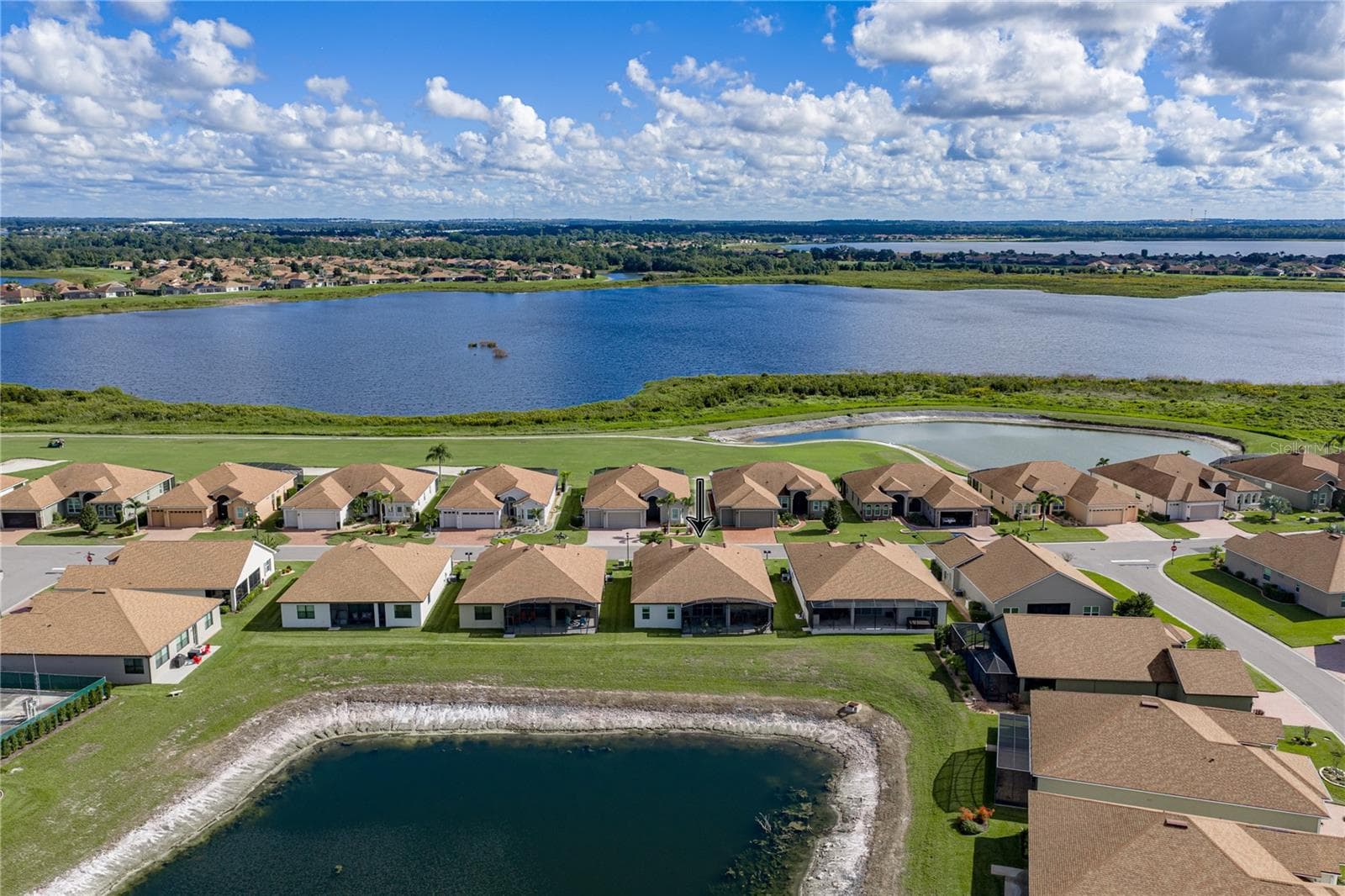 Neighborhood drone view - 6125 PEBBLE BEACH BLVD, WINTER HAVEN
