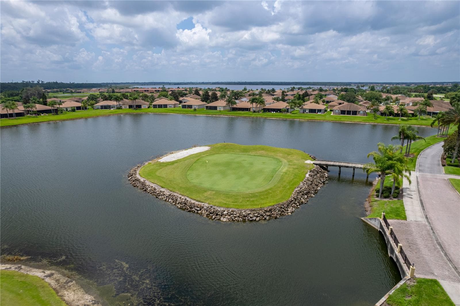 Lake Ashton island green - 6125 PEBBLE BEACH BLVD, WINTER HAVEN