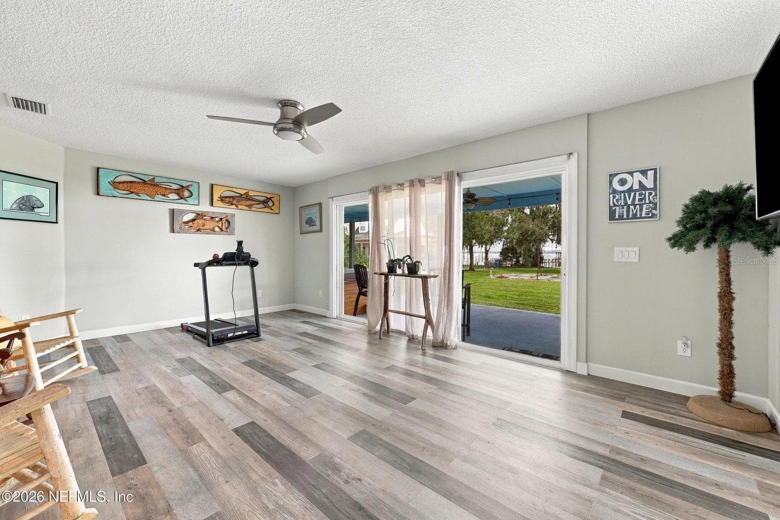 Family Room off living room - 424 CEDAR CREEK RD, PALATKA