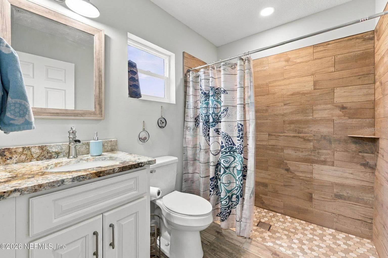 Bath off of laundry room - 424 CEDAR CREEK RD, PALATKA