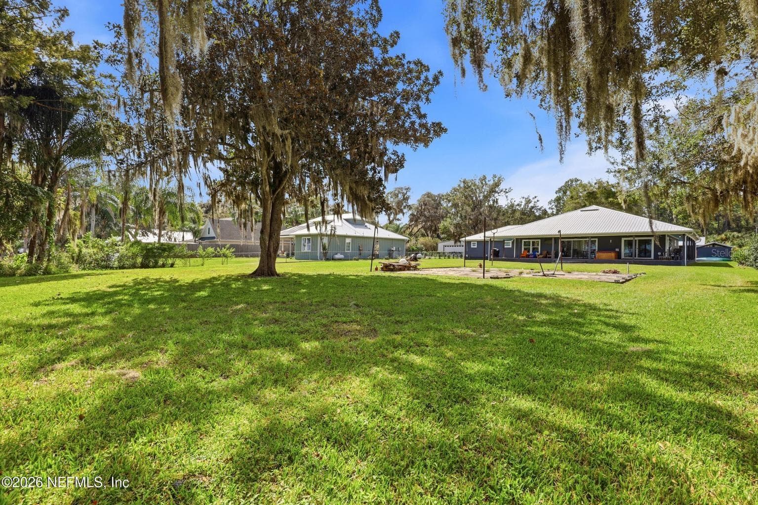 Looking from the river to the house - 424 CEDAR CREEK RD, PALATKA