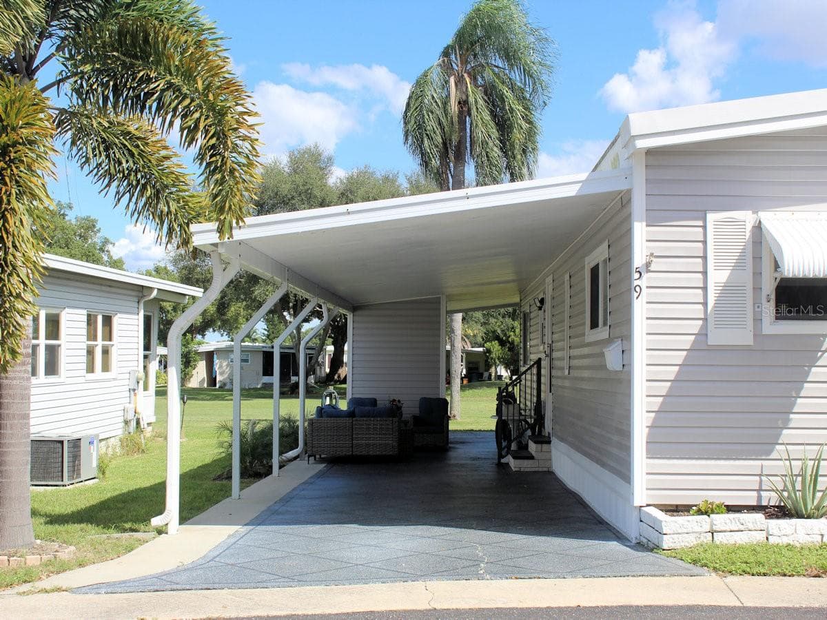 Mobile Home at PALM HILL MOBILE HOME PARK UNREC, LARGO, photo 2 of 15
