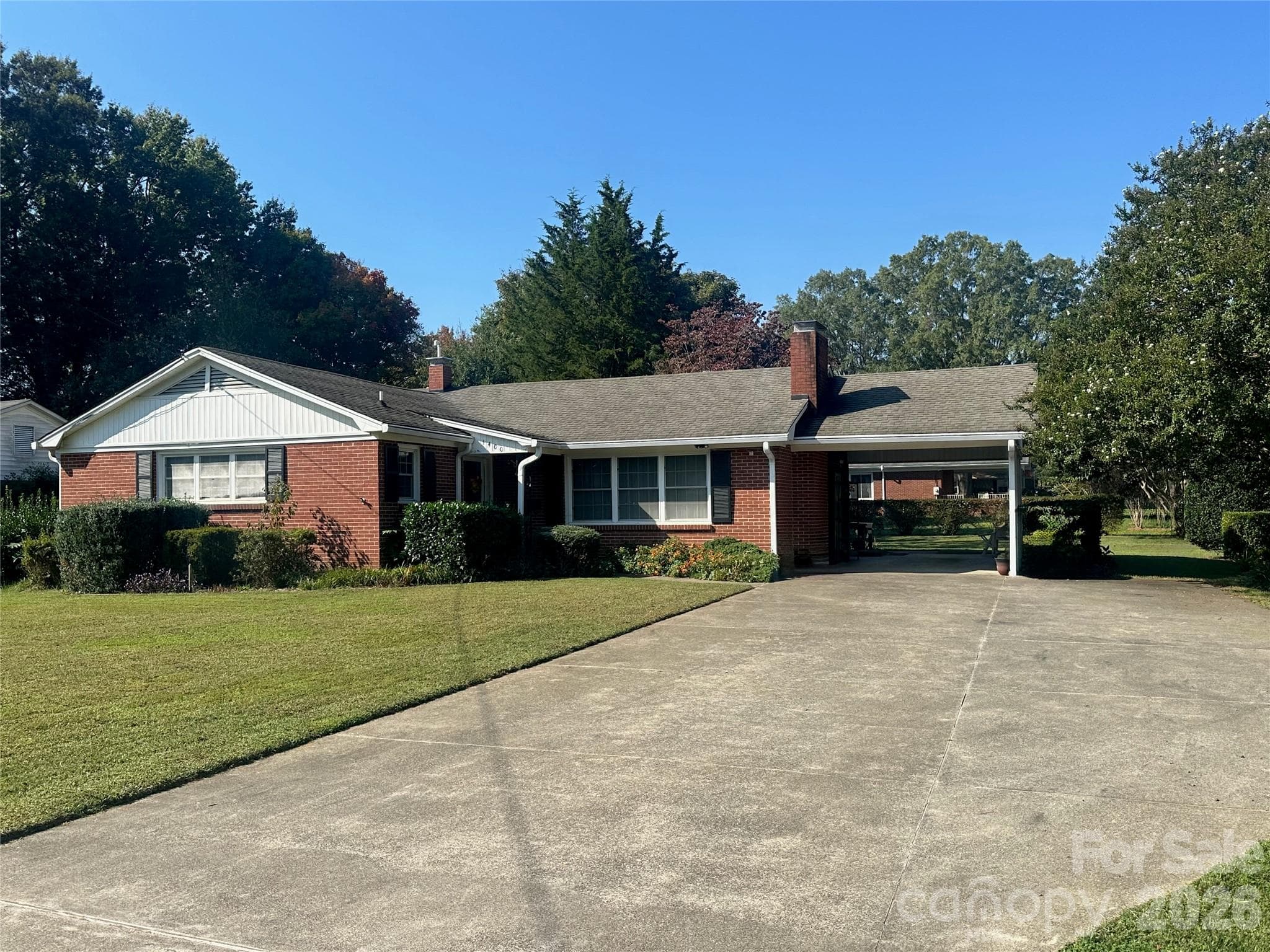 Exterior front with extra wide driveway - 1400 Capri Road, Winston Salem