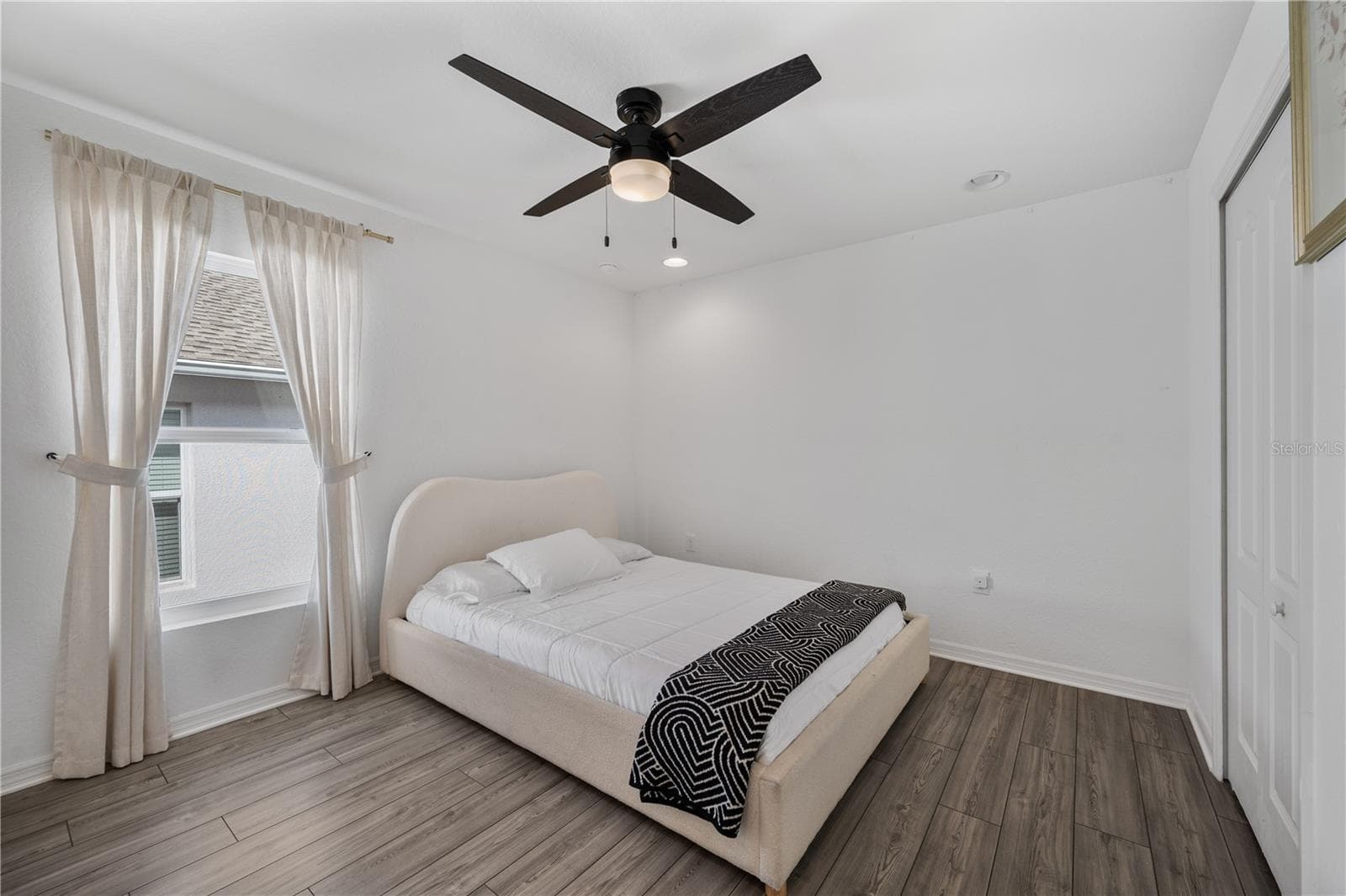 Bedroom # 2 is spacious and has a generous built in closet - 1279 PINTAIL PL, LAKELAND