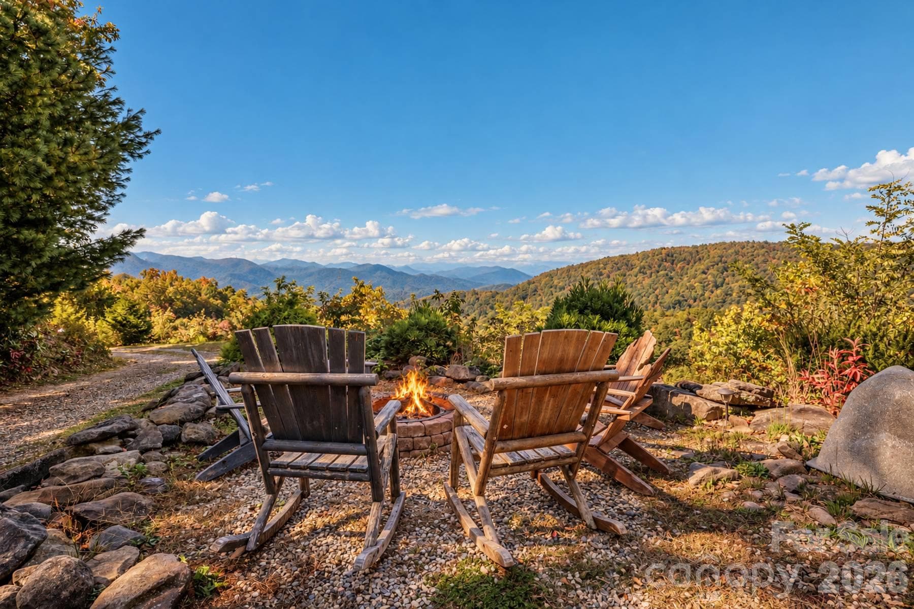 Fire pit seating overlooking long-range Smoky Mountain View’s - 18 Fairway Run, Bryson City