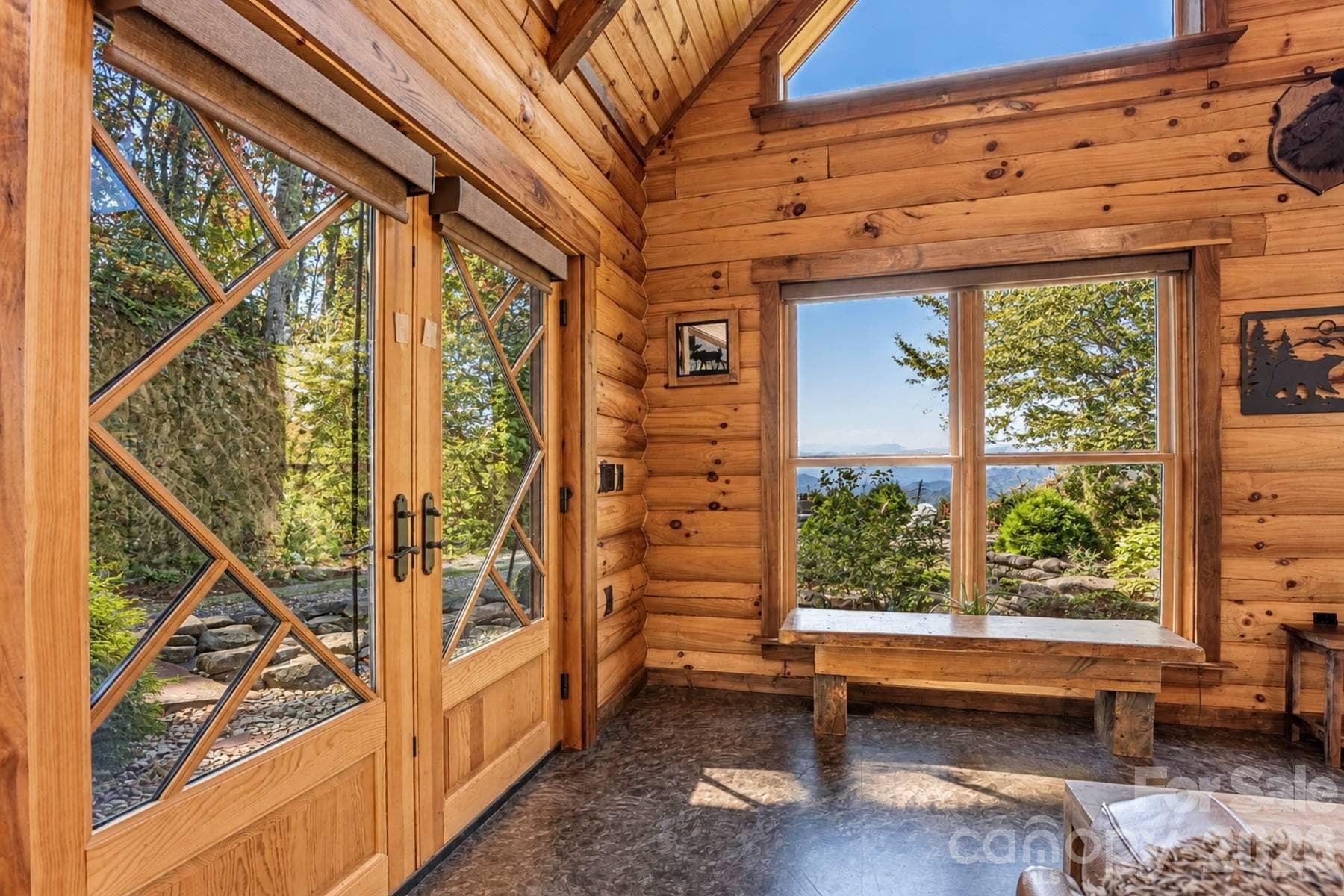 French doors and view window off the living area - 18 Fairway Run, Bryson City