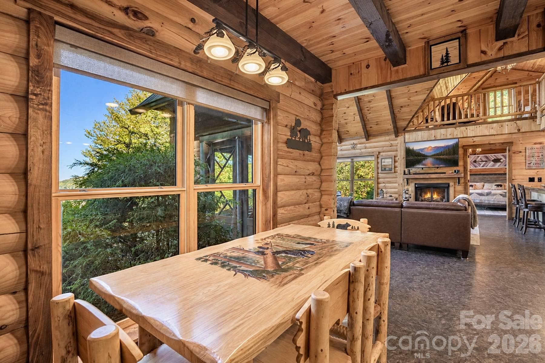 Dining area with mountain-view window - 18 Fairway Run, Bryson City