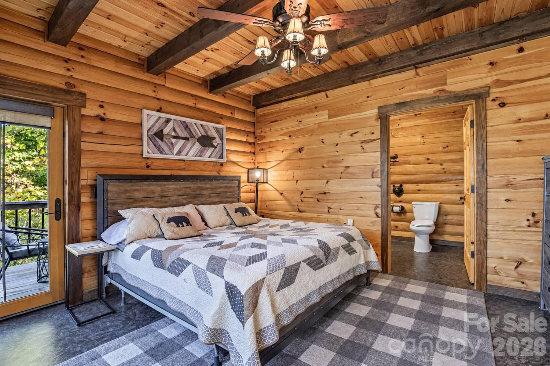 Primary bedroom with deck access and ensuite bath - 18 Fairway Run, Bryson City