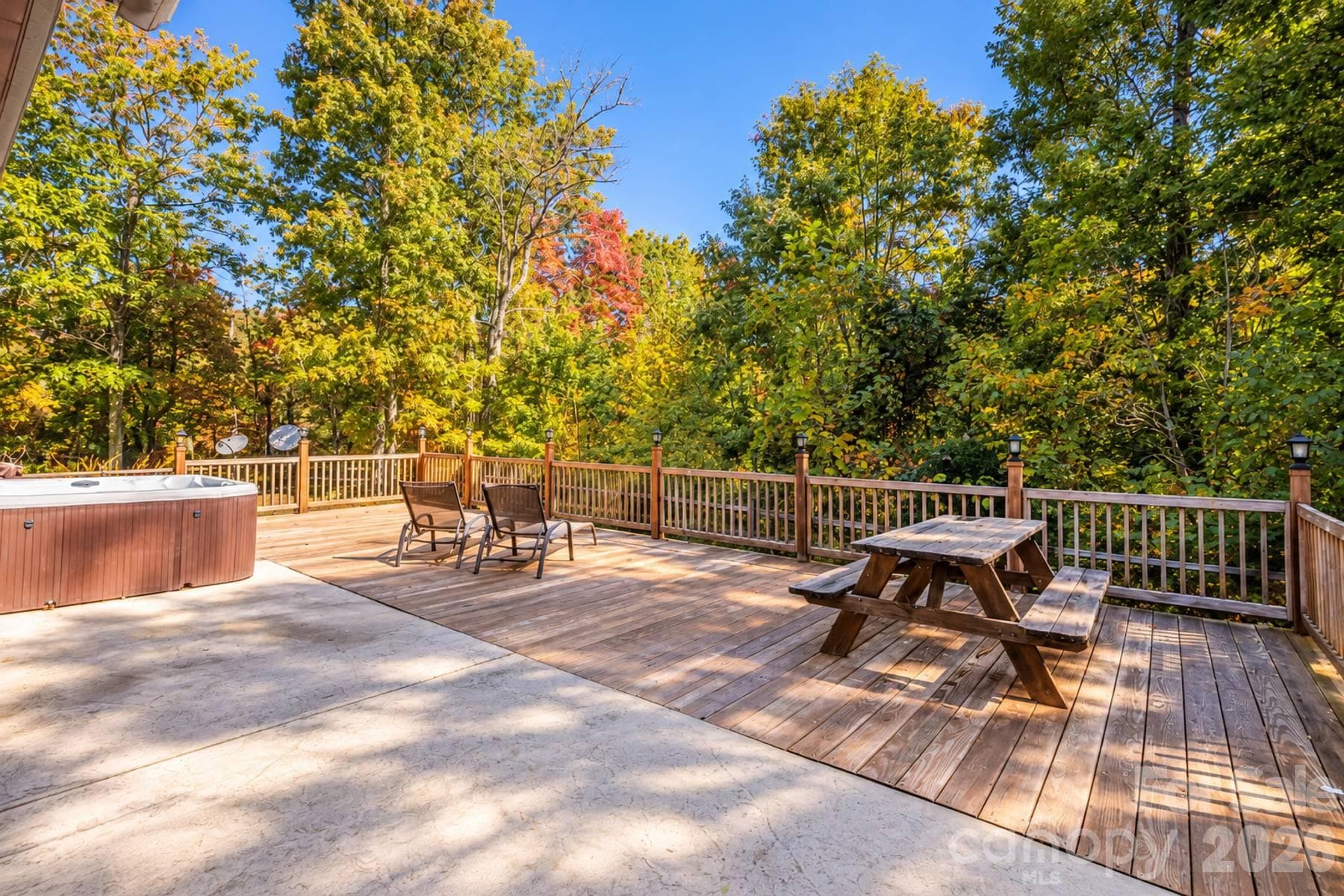 Large rear deck with hot tub and picnic seating - 18 Fairway Run, Bryson City