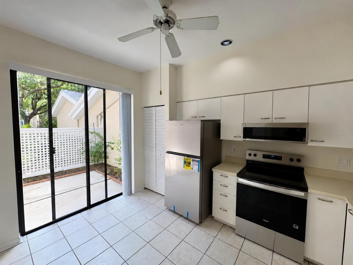 Kitchen Slider View Vacant - 5535 HAMPSTEAD HEATH #45, SARASOTA