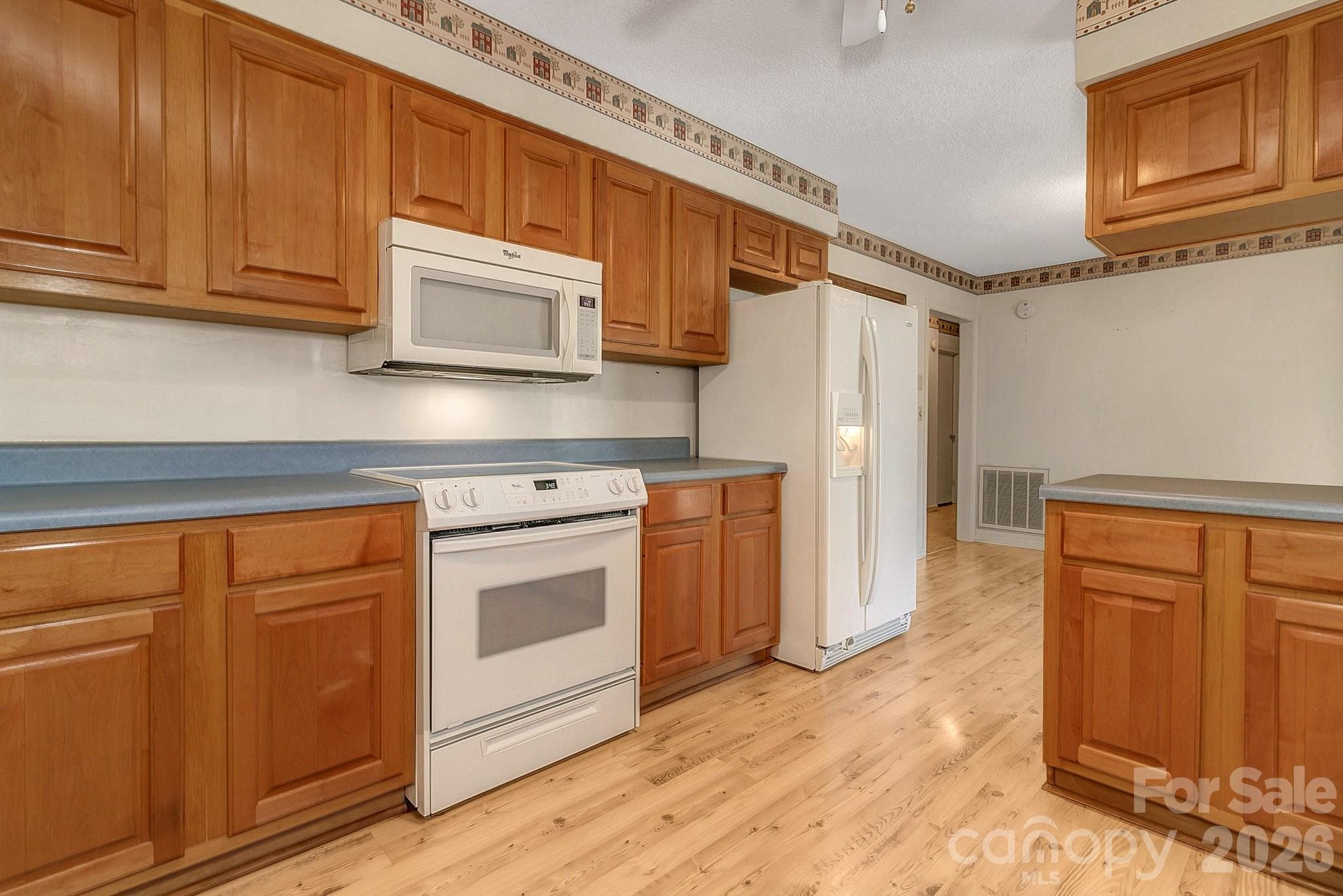 Kitchen view from laundry room - 1 Dewberry Lane, Hendersonville
