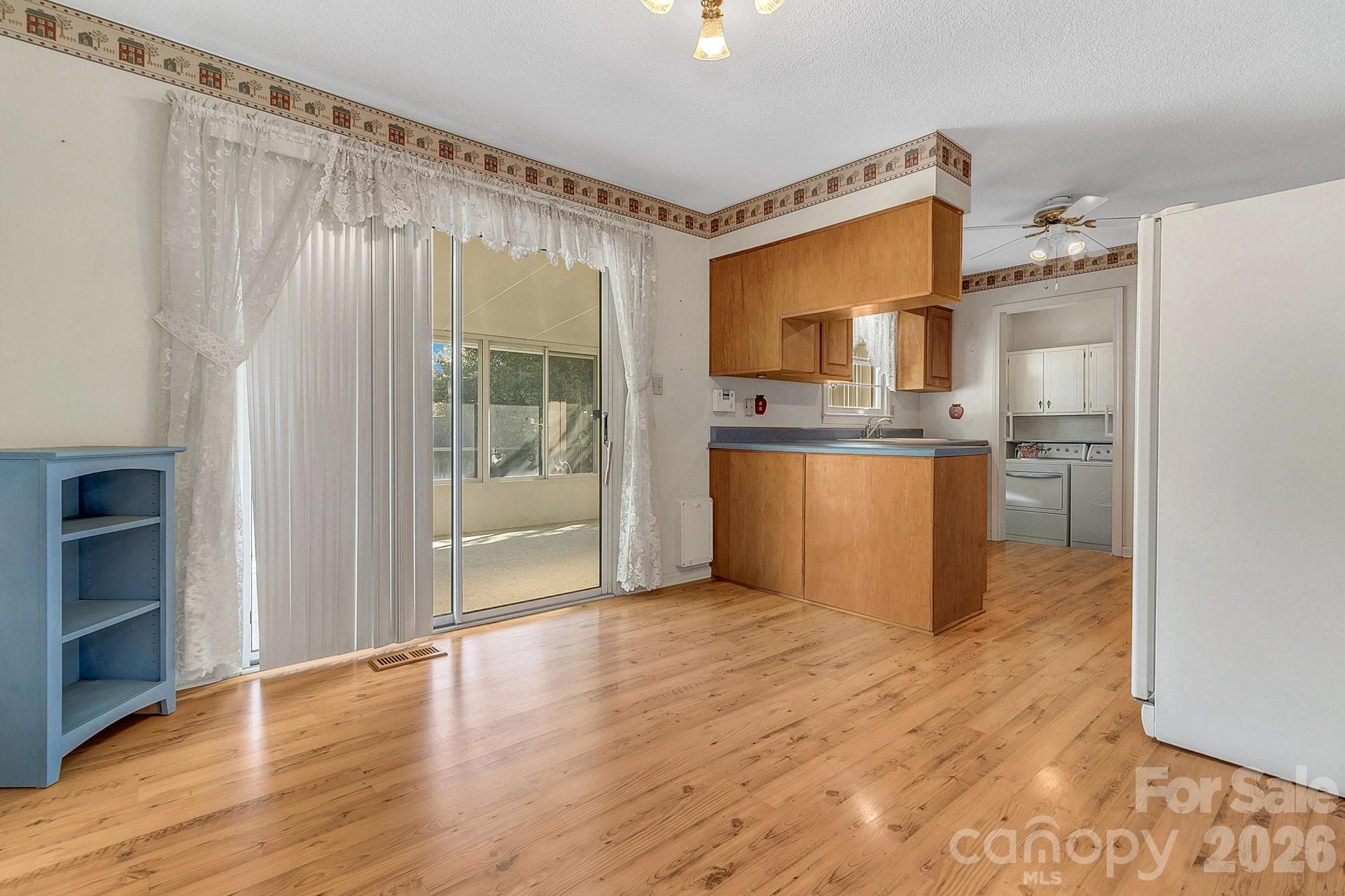 Dining area outside of kitchen w/sunroom access - 1 Dewberry Lane, Hendersonville