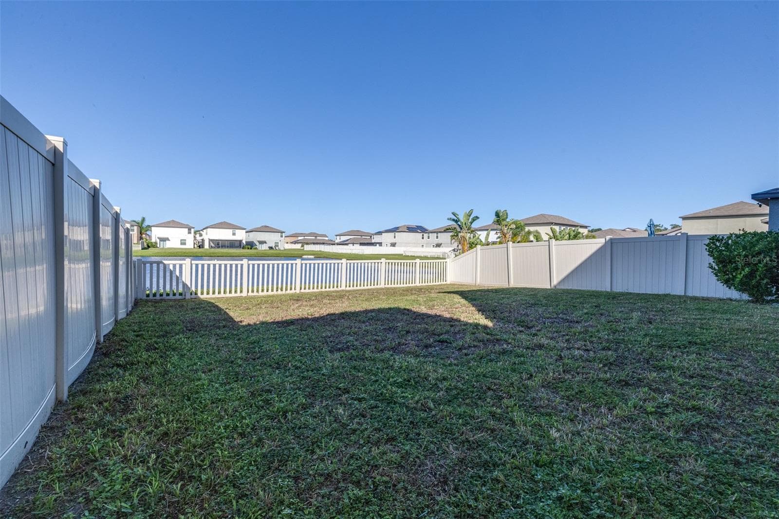 Fully Fenced yard overlooking pond - 16755 DELIA ST, WIMAUMA