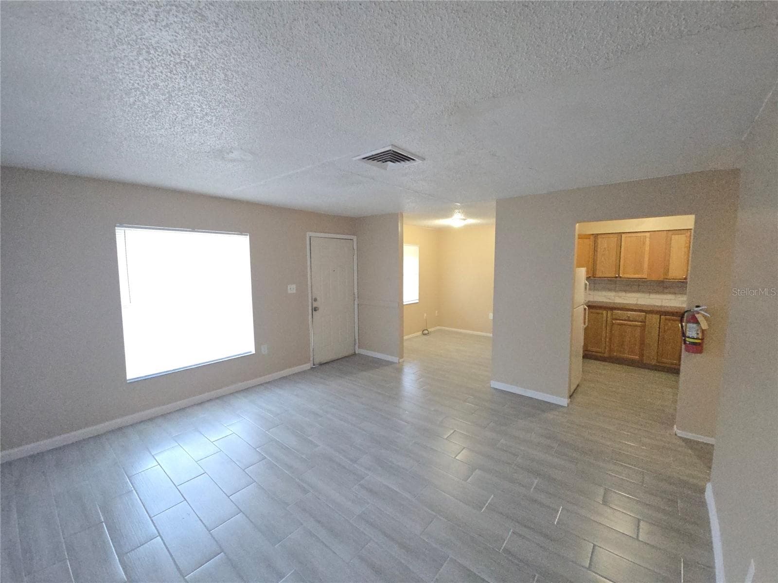1334 LIVING ROOM OTHER CORNER VIEW - SUNSET TERRACE SUB 7 PG45, LAKELAND