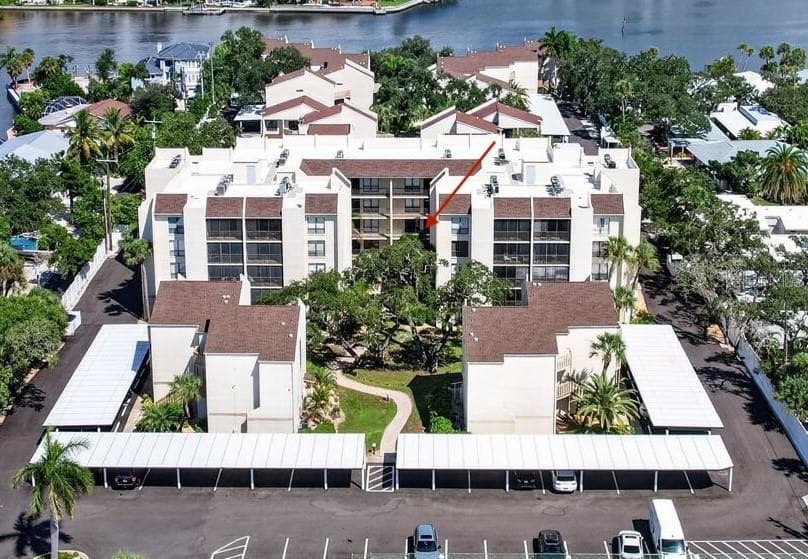 Arrow indicates the specific condo location on the 3rd floor. - 6157 MIDNIGHT PASS RD #E53, SARASOTA