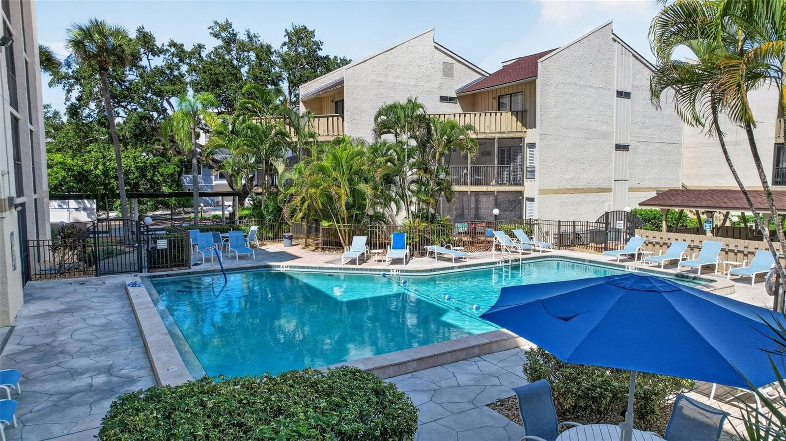 Resort-style pool. - 6157 MIDNIGHT PASS RD #E53, SARASOTA