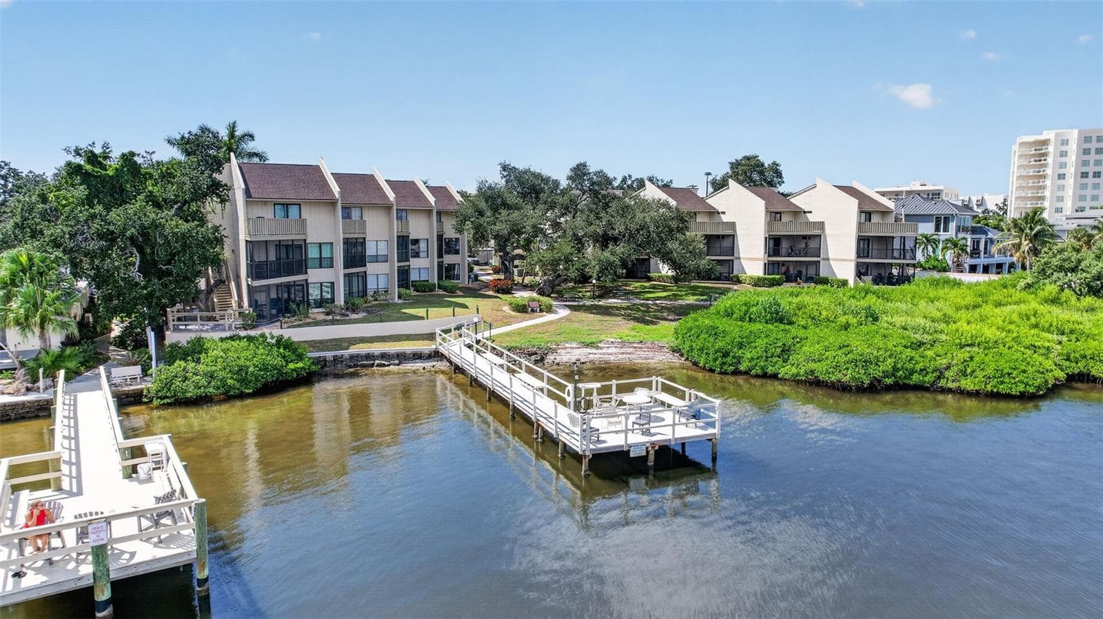 Fishing dock on the intercoastal waterway. - 6157 MIDNIGHT PASS RD #E53, SARASOTA