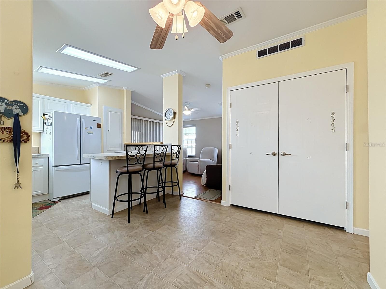 Behind those double doors is a stackable washer/dryer and storage space - 9000 US HIGHWAY 192 #181, CLERMONT