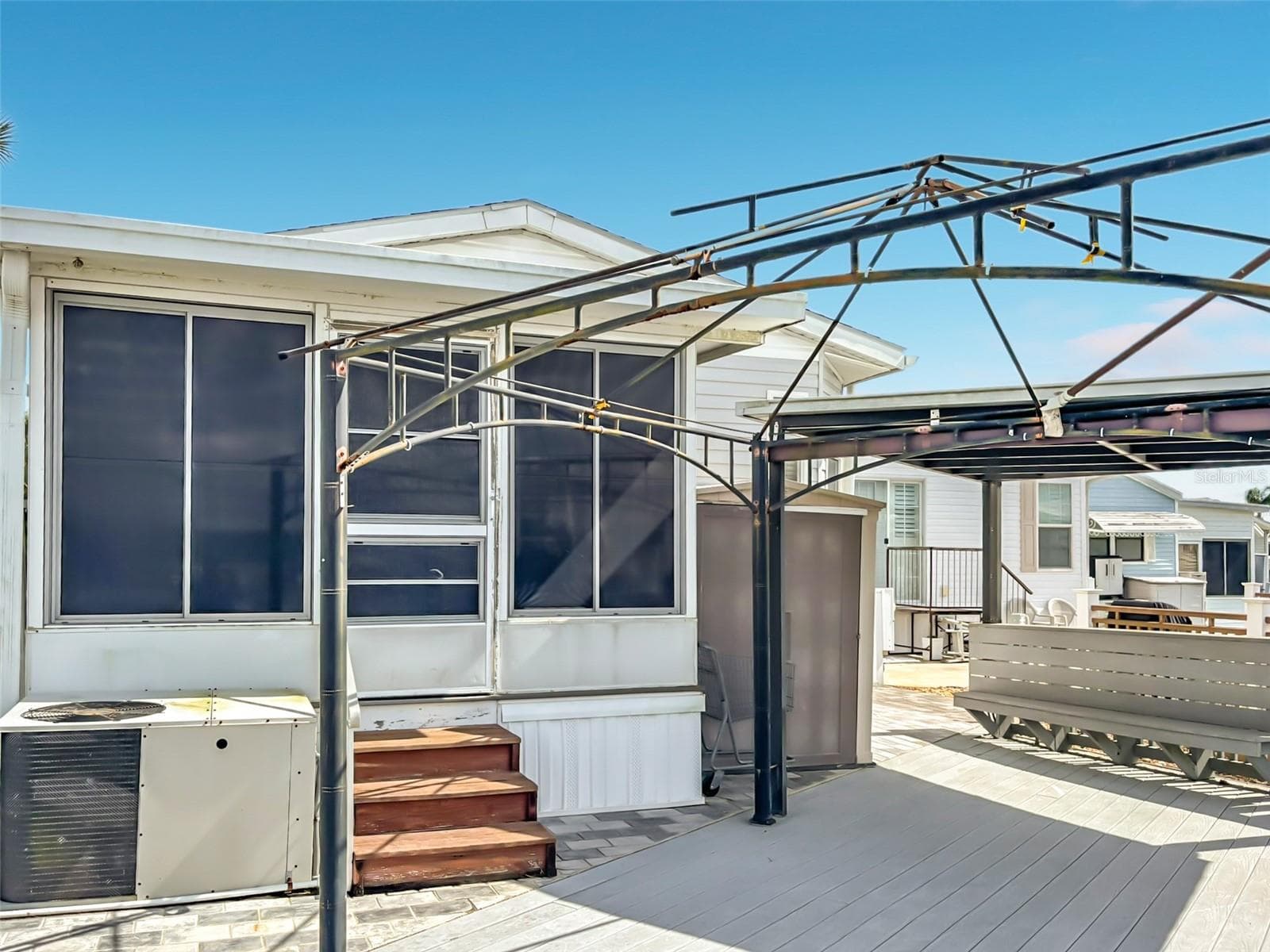 Expansive trex deck overlooks the canal to the rear of thr property - 9000 US HIGHWAY 192 #181, CLERMONT